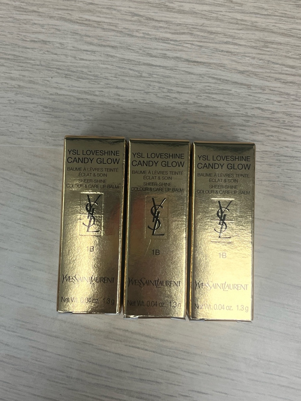 Yves Saint Laurent MINI Loveshine Candy Glow Lip Balm 1B 0.04oz Sell Individual